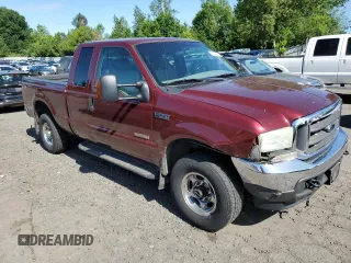 2004 Ford F-250 XL with VIN 1FTNX21P64EB90565, listed as a Copart auction lot 59022005 with 223,577 mi miles and Salvage title. Bid and sale history available at DreamBid. Image 4.