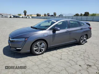 2019 Honda Clarity Touring z VIN JHMZC5F38KC007064, wystawiony jako Copart lot #55362015 z przebiegiem 74 565 mil mil oraz Szkoda całkowita • Salvage title. Historia ofert i sprzedaży dostępna na DreamBid. Obrazek 1.