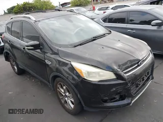 2015 Ford Escape Titanium with VIN 1FMCU0J93FUA79207, listed as a IAAI auction lot 42563888 with 103,862 mi miles and . Bid and sale history available at DreamBid. Image 1.