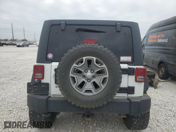 2013 Jeep Wrangler Unlimited Rubicon with VIN 1C4HJWFG1DL596618, listed as a Copart auction lot 41613725 with 142,775 mi miles and Clean Title. Bid and sale history available at carsss.com. Image 6.