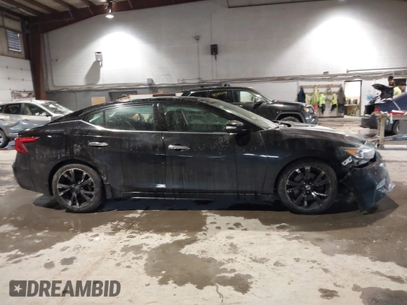 2017 Nissan Maxima SV with VIN 1N4AA6AP6HC451921, listed as a IAAI auction lot 41384995 with 74,160 mi miles and . Bid and sale history available at DreamBid. Image 14.