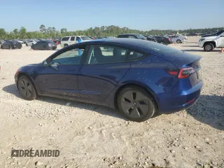 2023 Tesla Model 3 z VIN 5YJ3E1EA9PF712542, wystawiony jako Copart lot #52124295 z przebiegiem 13 154 mil mil oraz Czysty tytuł • Clean title. Historia ofert i sprzedaży dostępna na DreamBid. Obrazek 2.