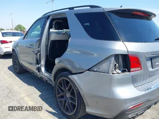 2016 Mercedes-Benz GLE 63 S AMG with VIN 4JGDA7FB6GA631271, listed as a IAAI auction lot 42470832 with 120,972 mi miles and . Bid and sale history available at DreamBid. Image 18.