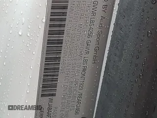 2018 Audi R8 V10 z VIN WUABAAFX5J7902445, wystawiony jako Copart lot #56587934 z przebiegiem Nie podano mil oraz Szkody całkowita. Historia ofert i sprzedaży dostępna na DreamBid. Obrazek 12.