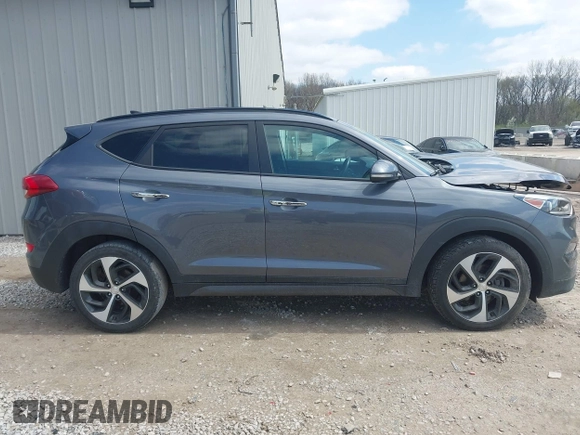 2016 Hyundai Tucson Eco with VIN KM8J3CA2XGU103017, listed as a IAAI auction lot 41897807 with 95,722 mi miles. Bid and sale history available at carsss.com. Image 13.