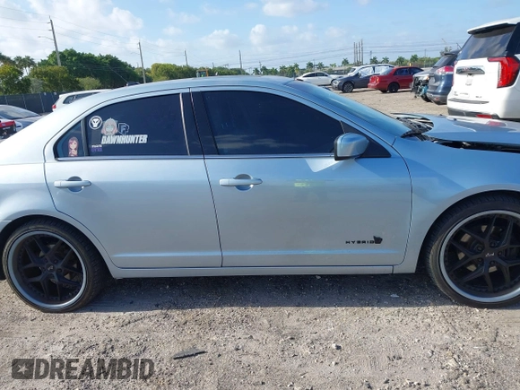 2010 Ford Fusion Hybrid with VIN 3FADP0L35AR354431, listed as a IAAI auction lot 42107722 with 142,250 mi miles. Bid and sale history available at carsss.com. Image 13.