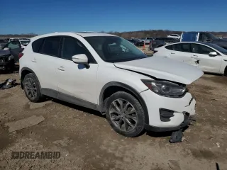 2016 Mazda CX-5 Grand Touring with VIN JM3KE4DYXG0781063, listed as a Copart auction lot 47099825 with 0 mi miles and Salvage Title. Bid and sale history available at carsss.com. Image 4.