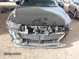 2023 Mazda 3 Premium Plus with VIN 3MZBPBEY6PM350056, listed as a IAAI auction lot 41940111 with 27,091 mi miles and . Bid and sale history available at DreamBid. Image 6.