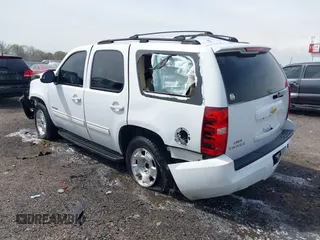 2011 Chevrolet Tahoe LS with VIN 1GNSCAE09BR352496, listed as a IAAI auction lot 41888764 with 234,311 mi miles and . Bid and sale history available at DreamBid. Image 3.