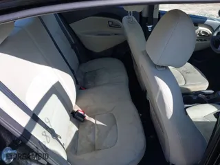 2013 Kia Rio LX with VIN KNADM4A33D6258292, listed as a IAAI auction lot 41886899 with 123,840 mi miles. Bid and sale history available at carsss.com. Image 8.