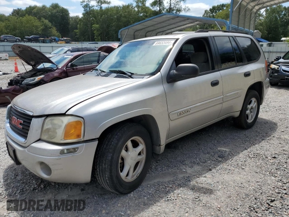 2004 GMC Envoy SLE with VIN 1GKDS13S942119615, listed as a Copart auction lot 69653494 with 141,856 mi miles and Salvage Title. Bid and sale history available at carsss.com. Image 1.