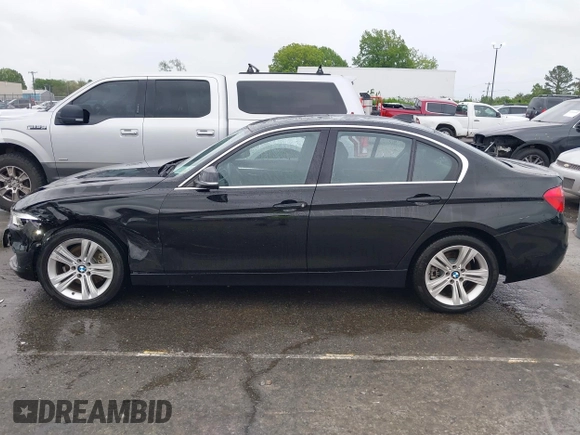 2018 BMW 3 Series 330i xDrive with VIN WBA8D9G50JNU69376, listed as a IAAI auction lot 41971138 with 61,551 mi miles. Bid and sale history available at carsss.com. Image 14.