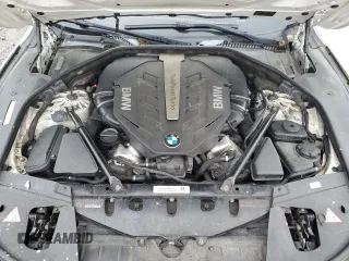 2012 BMW 7 Series 750i z VIN WBAKA8C51CCY37495, wystawiony jako Copart lot #56914295 z przebiegiem 126 697 mil mil oraz Tytuł czysty. Historia ofert i sprzedaży dostępna na DreamBid. Obrazek 11.