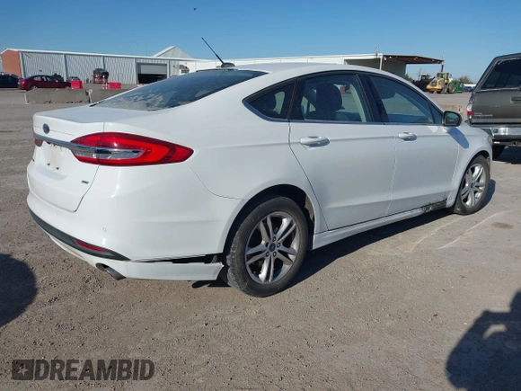 2018 Ford Fusion SE with VIN 3FA6P0H71JR262575, listed as a IAAI auction lot 41408259 with 96,624 mi miles and . Bid and sale history available at DreamBid. Image 4.