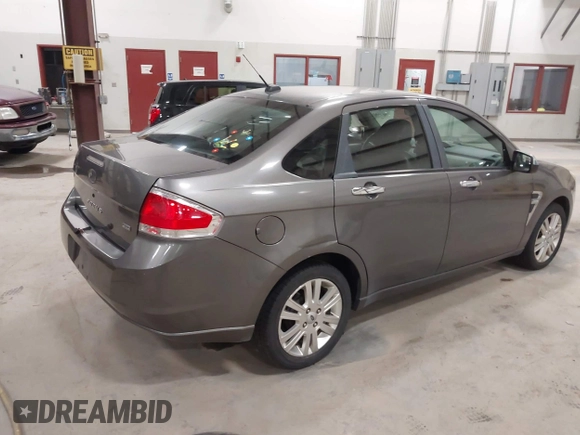 2009 Ford Focus SEL with VIN 1FAHP37N39W253086, listed as a IAAI auction lot 41825983 with 158,720 mi miles. Bid and sale history available at carsss.com. Image 4.
