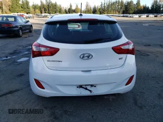 2016 Hyundai Elantra GT with VIN KMHD35LH0GU318979, listed as a Copart auction lot 77449704 with 100,229 mi miles and Salvage Title. Bid and sale history available at carsss.com. Image 6.