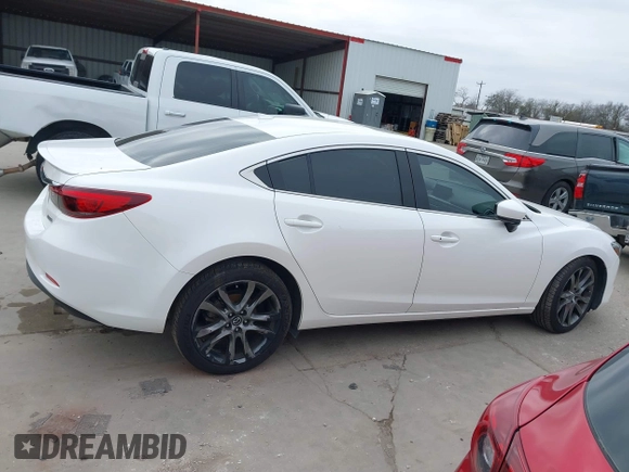 2017 Mazda 6 Grand Touring with VIN JM1GL1W57H1126716, listed as a IAAI auction lot 41619715 with 105,332 mi miles and . Bid and sale history available at DreamBid. Image 13.