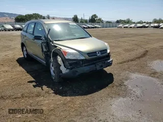 2009 Honda CR-V LX z VIN 5J6RE38389L002173, wystawiony jako Copart lot #58443535 z przebiegiem 124 346 mil mil oraz Szkoda całkowita • Salvage title. Historia ofert i sprzedaży dostępna na DreamBid. Obrazek 14.
