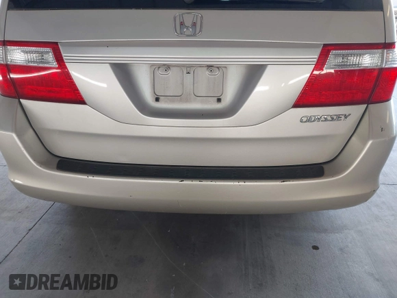 2005 Honda Odyssey EX-L with VIN 5FNRL38705B106488, listed as a IAAI auction lot 42545141 with 199,619 mi miles and . Bid and sale history available at DreamBid. Image 16.