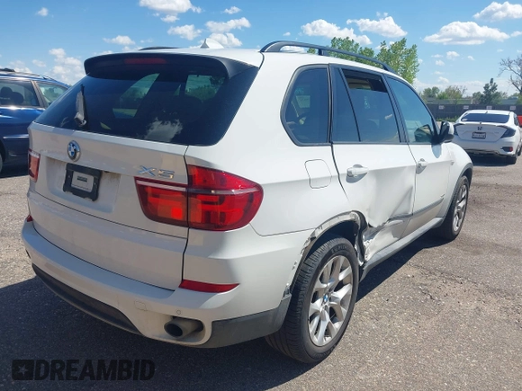 2011 BMW X5 35i z VIN 5UXZV4C57BL412326, wystawiony jako IAAI lot #42169632 z przebiegiem 93 153 mil mil oraz . Historia ofert i sprzedaży dostępna na DreamBid. Obrazek 4.