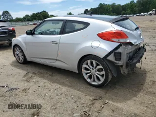 2013 Hyundai Veloster w/Gray Int z VIN KMHTC6AD3DU135296, wystawiony jako Copart lot #59778985 z przebiegiem 125 134 mil mil oraz Czysty tytuł • Clean title. Historia ofert i sprzedaży dostępna na DreamBid. Obrazek 2.