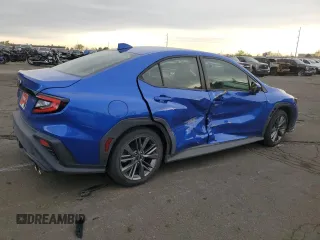 2023 Subaru WRX with VIN JF1VBAA64P9820666, listed as a Copart auction lot 52422165 with 10,726 mi miles and Salvage title. Bid and sale history available at DreamBid. Image 3.