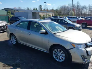 2014 Toyota Camry Hybrid LE with VIN 4T1BD1FK0EU112479, listed as a IAAI auction lot 41901348 with 91,440 mi miles. Bid and sale history available at carsss.com. Image 1.