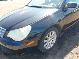 2010 Chrysler Sebring Limited with VIN 1C3CC5FB8AN140459, listed as a IAAI auction lot 41657740 with 199,682 mi miles and . Bid and sale history available at DreamBid. Image 6.