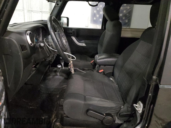 2012 Jeep Wrangler Arctic with VIN 1C4AJWBG3CL164439, listed as a Copart auction lot 88444625 with 189,039 mi miles and Salvage title. Bid and sale history available at DreamBid. Image 7.