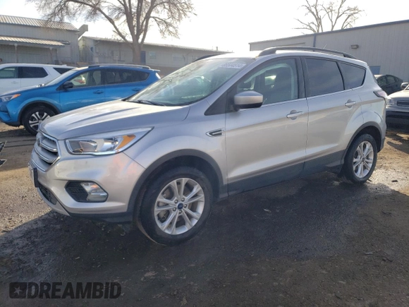 2018 Ford Escape SE with VIN 1FMCU0G96JUC38690, listed as a Copart auction lot 86504514 with 90,811 mi miles and Salvage Title. Bid and sale history available at carsss.com. Image 1.