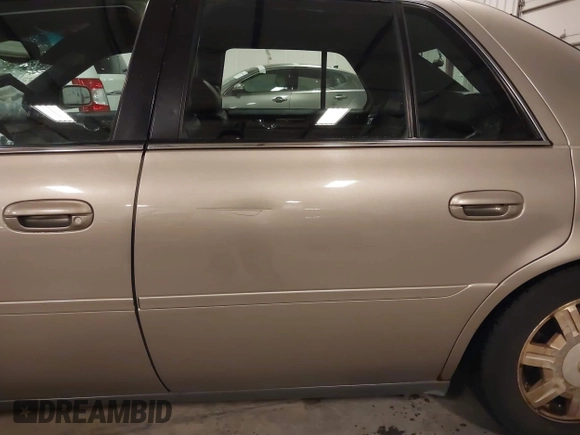 2004 Cadillac DeVille z VIN 1G6KD54Y04U119341, wystawiony jako IAAI lot #42193664 z przebiegiem 162 290 mil mil oraz . Historia ofert i sprzedaży dostępna na DreamBid. Obrazek 19.