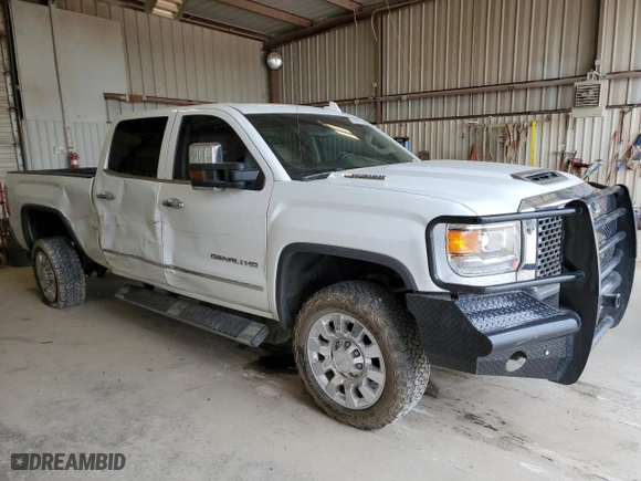 2017 GMC Sierra 2500HD Denali with VIN 1GT12UEY9HF194282, listed as a Copart auction lot 47556515 with 122,430 mi miles and Salvage Title. Bid and sale history available at carsss.com. Image 4.