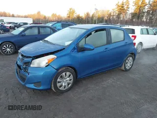 2012 Toyota Yaris L with VIN JTDKTUD37CD539286, listed as a IAAI auction lot 41219674 with 59,292 mi miles. Bid and sale history available at carsss.com. Image 2.
