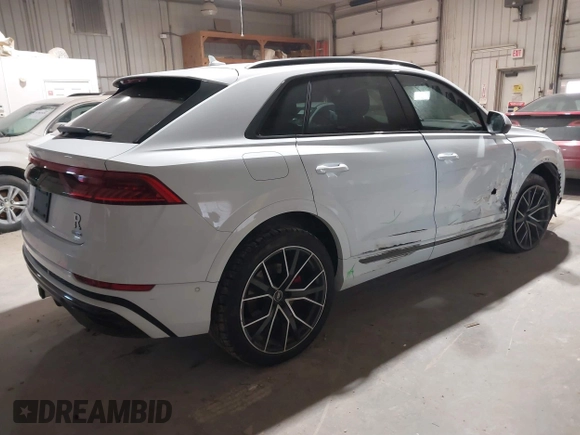 2021 Audi Q8 Premium Plus z VIN WA1EVAF11MD013975, wystawiony jako IAAI lot #41380207 z przebiegiem 77 979 mil mil oraz . Historia ofert i sprzedaży dostępna na DreamBid. Obrazek 4.