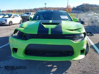 2019 Dodge Charger GT with VIN 2C3CDXHG1KH706666, listed as a IAAI auction lot 40866969 with Not Provided miles and . Bid and sale history available at DreamBid. Image 11.