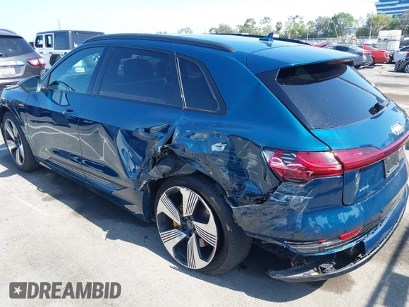 2022 Audi e-tron Premium Plus with VIN WA1LAAGE1NB008616, listed as a IAAI auction lot 42723244 with 36,800 mi miles and . Bid and sale history available at DreamBid. Image 6.
