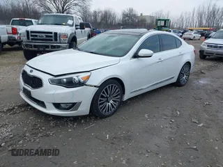 2014 Kia Cadenza Premium with VIN KNALN4D7XE5129562, listed as a IAAI auction lot 41922550 with 142,136 mi miles. Bid and sale history available at carsss.com. Image 2.