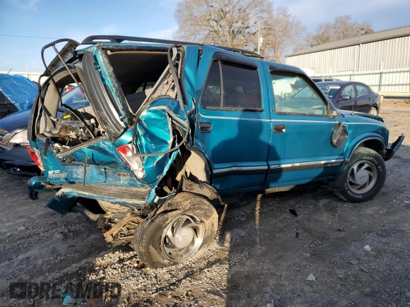 1995 Chevrolet Blazer z VIN 1GNDT13W2SK204831, wystawiony jako Copart lot #86301424 z przebiegiem 122 281 mil mil oraz Szkoda całkowita • Salvage title. Historia ofert i sprzedaży dostępna na DreamBid. Obrazek 3.