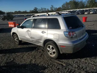 2004 Mitsubishi Outlander LS with VIN JA4LZ31F74U028300, listed as a Copart auction lot 76228644 with 174,424 mi miles and Salvage Title. Bid and sale history available at carsss.com. Image 2.