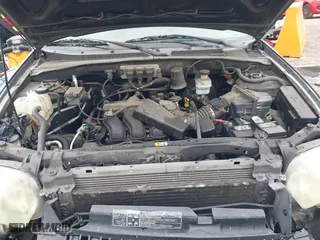 2005 Ford Escape Limited with VIN 1FMYU04155KC05430, listed as a IAAI auction lot 41784958 with 190,822 mi miles. Bid and sale history available at carsss.com. Image 10.