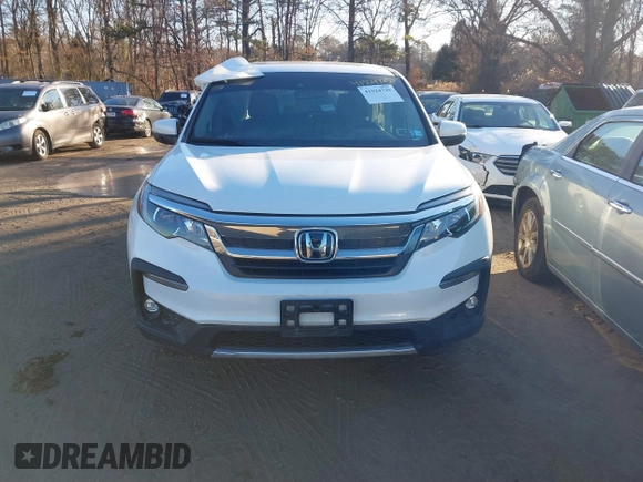 2022 Honda Pilot EX-L with VIN 5FNYF6H54NB084899, listed as a IAAI auction lot 41524725 with 35,827 mi miles and . Bid and sale history available at DreamBid. Image 12.