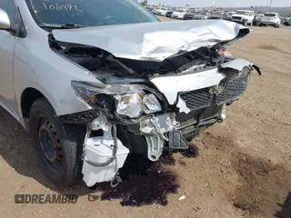 2010 Toyota Corolla with VIN JTDBU4EE0A9106972, listed as a IAAI auction lot 41896820 with 151,483 mi miles and . Bid and sale history available at DreamBid. Image 13.