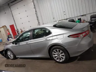 2019 Toyota Camry LE z VIN 4T1B11HK5KU814007, wystawiony jako IAAI lot #42099677 z przebiegiem 91 779 mil mil oraz . Historia ofert i sprzedaży dostępna na DreamBid. Obrazek 14.