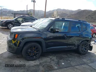 2018 Jeep Renegade Altitude with VIN ZACCJABB6JPH40341, listed as a IAAI auction lot 41582205 with 58,011 mi miles and . Bid and sale history available at DreamBid. Image 14.