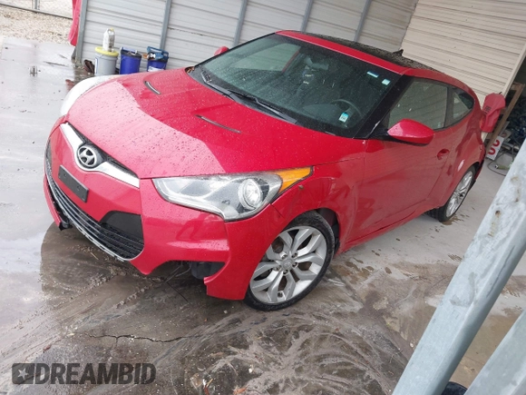 2013 Hyundai Veloster w/Gray Int with VIN KMHTC6AD4DU092345, listed as a IAAI auction lot 41382227 with 134,621 mi miles. Bid and sale history available at carsss.com. Image 2.