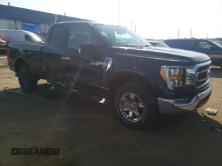 2021 Ford F-150 XL with VIN 1FTFX1E88MKD05444, listed as a Copart auction lot 71669704 with 35,779 mi miles and Salvage title. Bid and sale history available at DreamBid. Image 4.