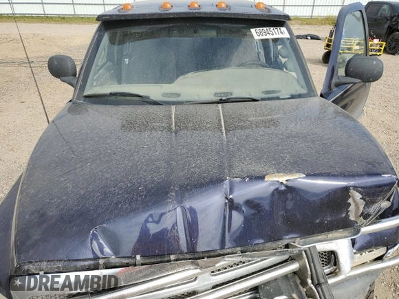 1999 Dodge Ram 2500 with VIN 1B7KF2368XJ511110, listed as a Copart auction lot 68945174 with 173,983 mi miles and Salvage Title. Bid and sale history available at carsss.com. Image 13.
