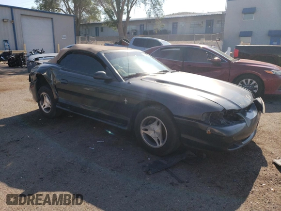 1998 Ford Mustang with VIN 1FAFP444XWF176396, listed as a Copart auction lot 61322984 with 86,168 mi miles and Salvage title. Bid and sale history available at DreamBid. Image 4.