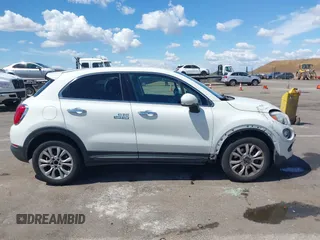 2016 FIAT 500X Lounge z VIN ZFBCFXDT0GP333273, wystawiony jako IAAI lot #42269130 z przebiegiem 98 707 mil mil oraz . Historia ofert i sprzedaży dostępna na DreamBid. Obrazek 13.
