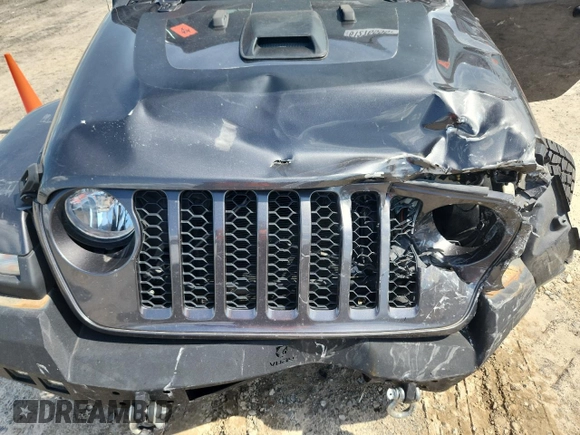 2021 Jeep Gladiator 80th Anniversary с VIN 1C6HJTAG7ML521094, выставлен на аукционе Copart как лот 61276595 с пробегом 68 684 миль миль и Списание • Salvage title. История ставок и продаж доступна на DreamBid. Изображение 11.